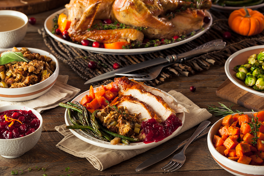 An overhead shot of fresh Thanksgiving foods.