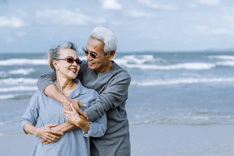 Senior couple enjoying time on the beach.