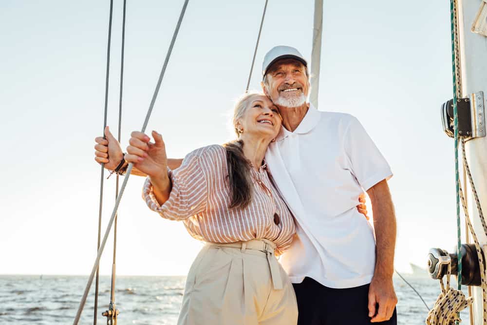 Senior couple on a sailboat