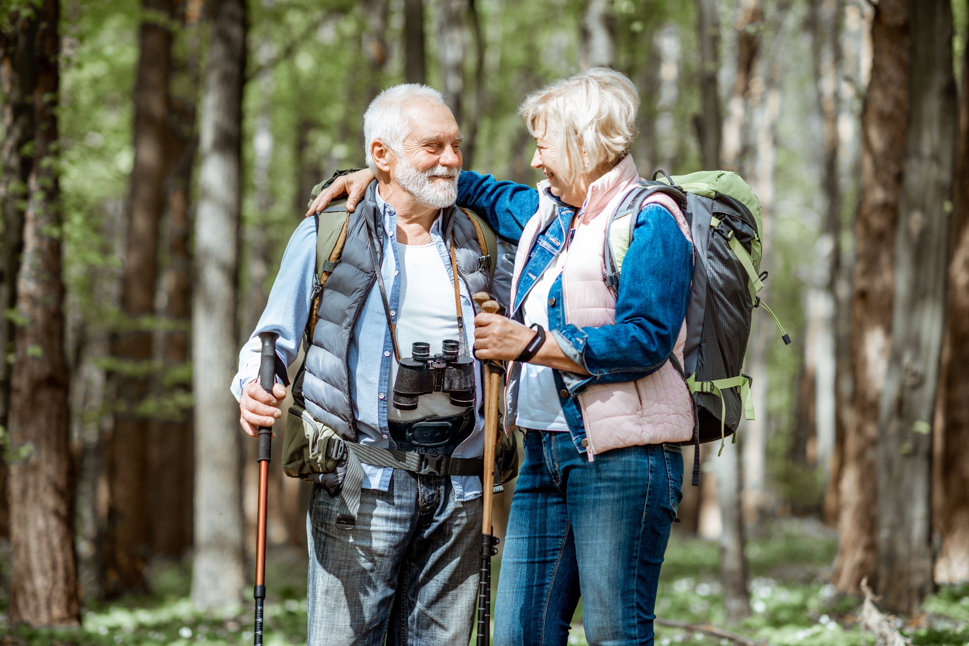 Happy senior couple on a walking trail