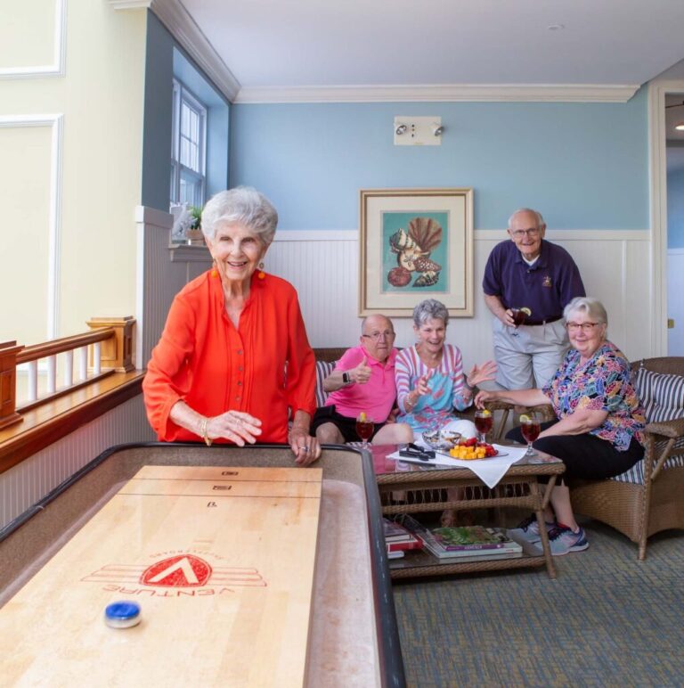 Group of Seniors Smiling and Playing Games