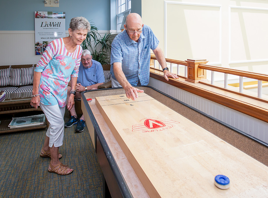 Group of Seniors Playing Game Smiling