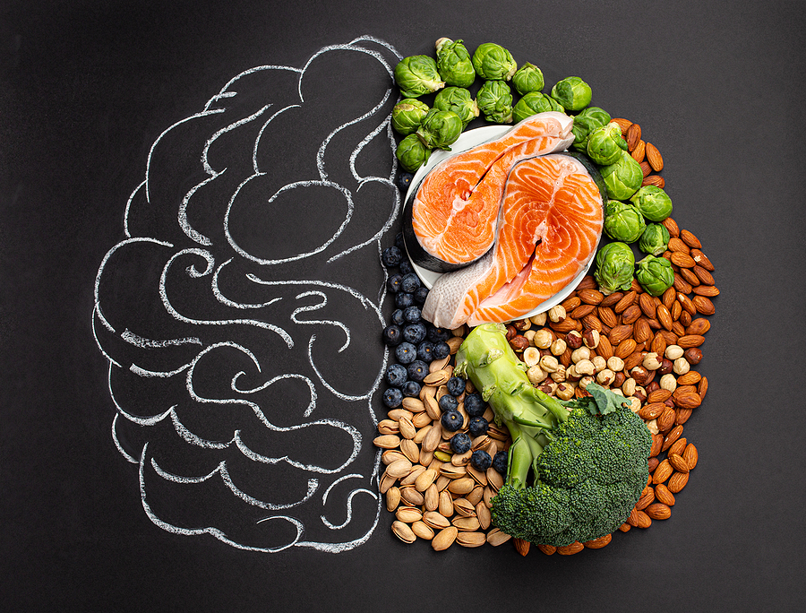 Chalk outline of the brain with healthy foods