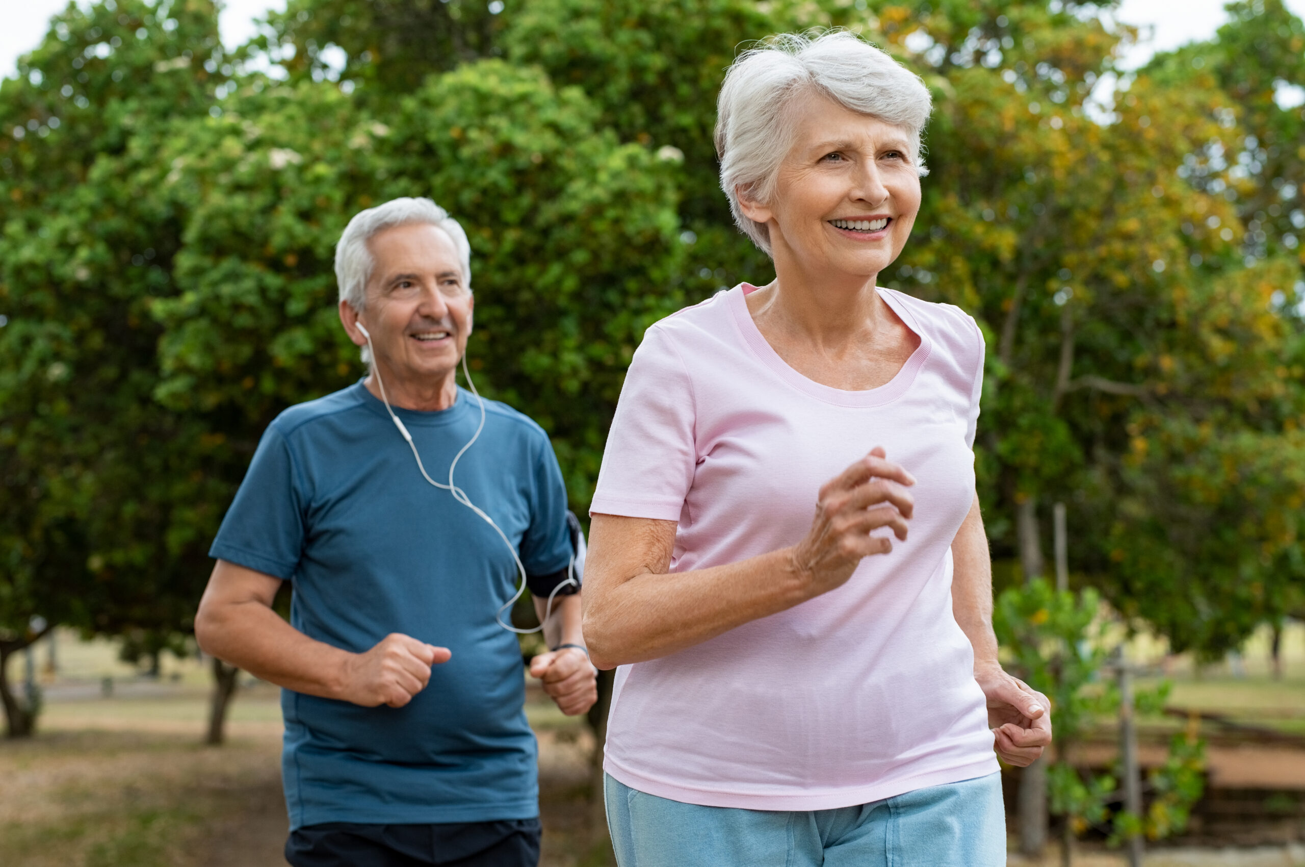 A senior couple lives an active lifestyle through running