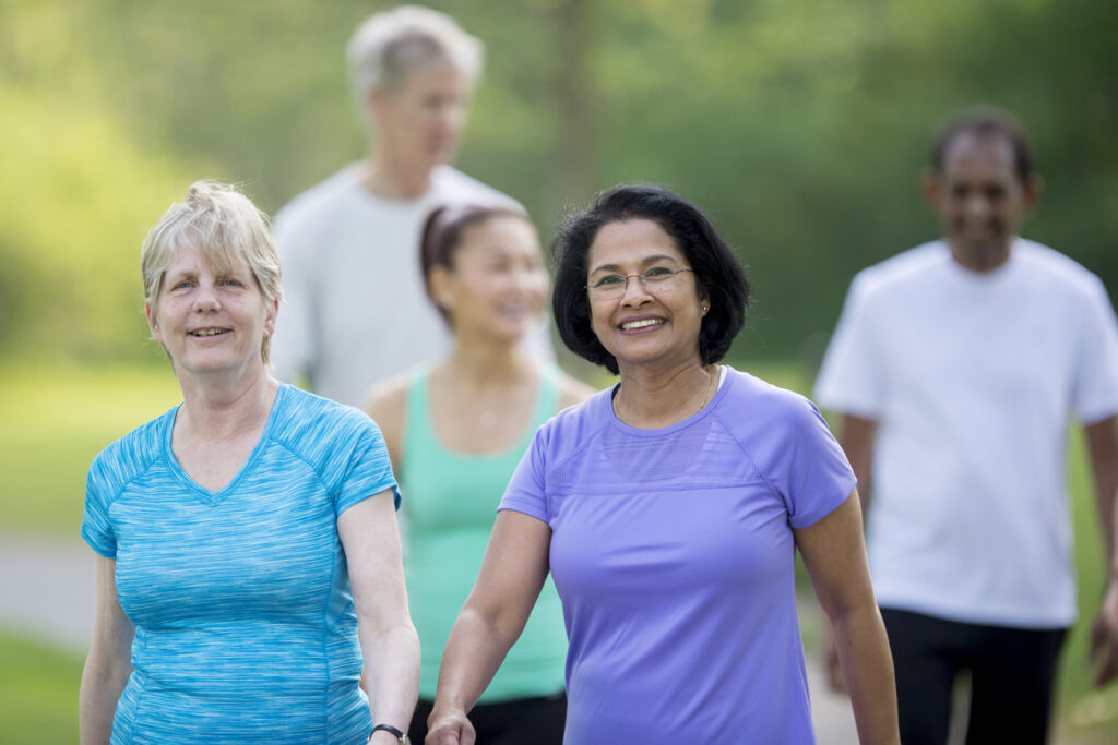 Seniors Enjoying a Walk at the Park