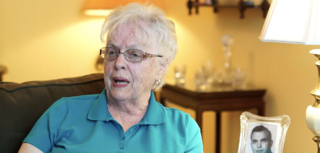 senior woman in blue polo